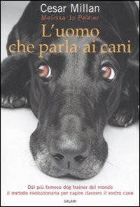 UOMO CHE PARLA AI CANI