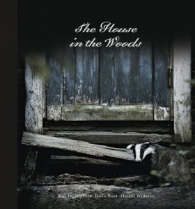 THE HOUSE IN THE WOODS